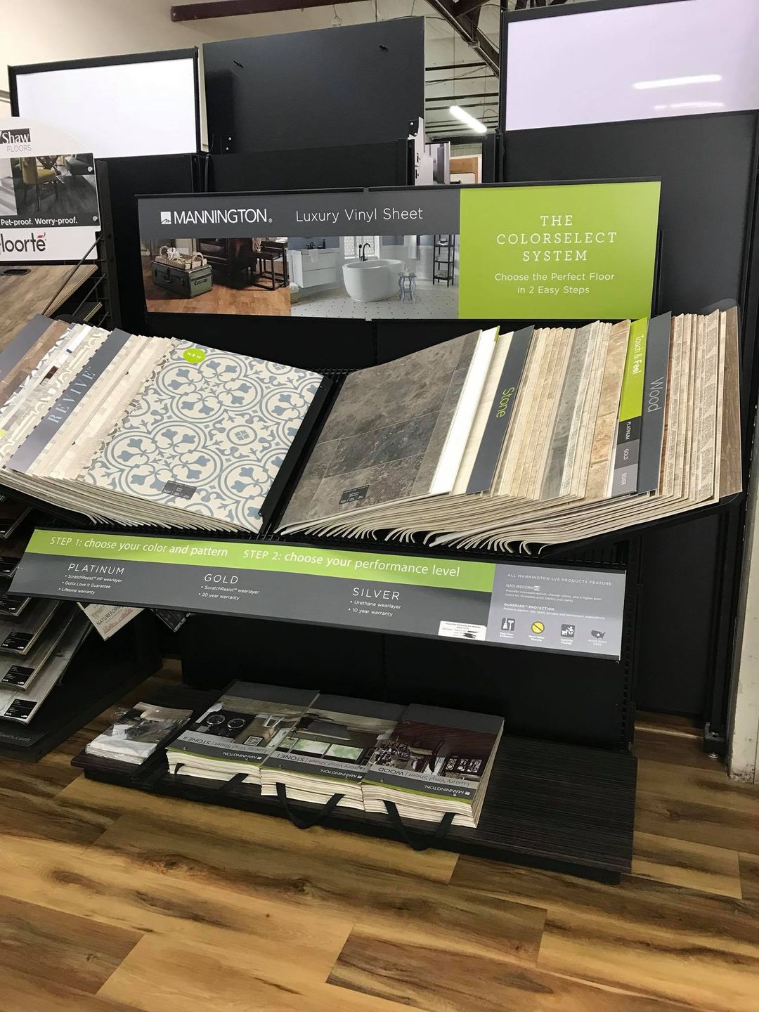 Variety of flooring products in showroom | Floors Plus, Inc